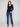 Elegant black sweater with ribbed texture and heart rivets adding charm to the look by Charlie B.