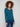 Evergreen ribbed sweater showcasing a flattering slim fit, complemented by heart rivets on the sleeves by Charlie B.