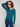 Elegant evergreen sweater with slit cuffs and heart rivet details, perfect for a refined look by Charlie B.