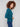 Sophisticated evergreen sweater featuring charming heart rivets on the sleeves and a slimming silhouette by Charlie B.