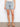 Featuring a five-pocket design, these blue striped denim shorts are perfect for casual outings by Charlie B.