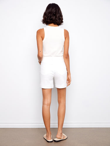 Crafted from premium materials, these white twill shorts offer durability and elegance in every detail by Charlie B.