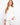White cotton sweater featuring a crew neckline and stylish 3/4 sleeves, designed for comfort by Charlie B.