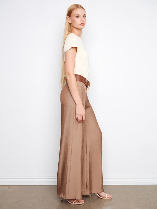 These pants come with practical slash pockets, combining style and functionality seamlessly. By Charlie B.