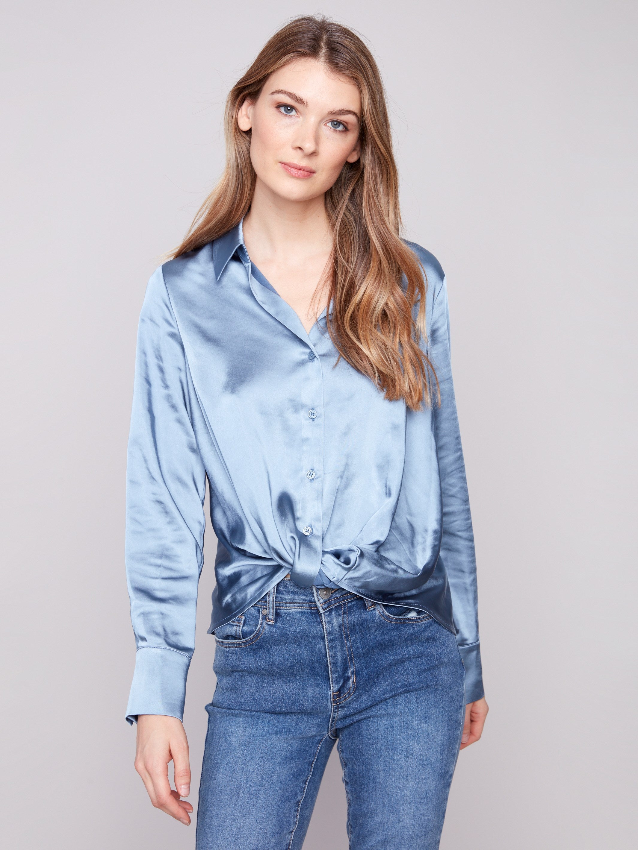 Blue satin shirt featuring a soft fabric and long sleeves, perfect for a chic look by Charlie B.