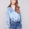 Blue satin shirt featuring a soft fabric and long sleeves, perfect for a chic look by Charlie B.