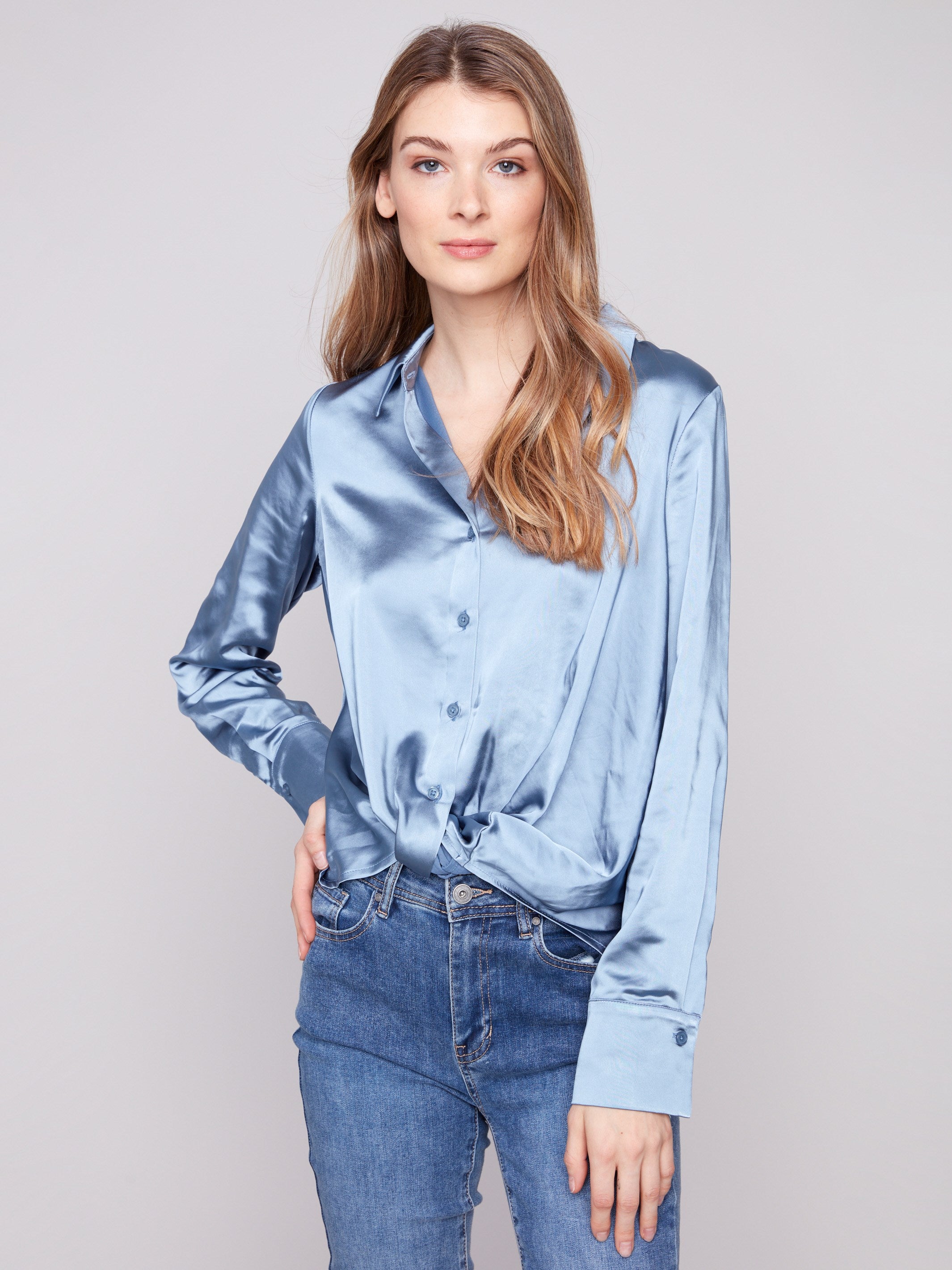 Stylish blue satin shirt with a classic shirt collar and button-down closure for versatile wear by Charlie B.