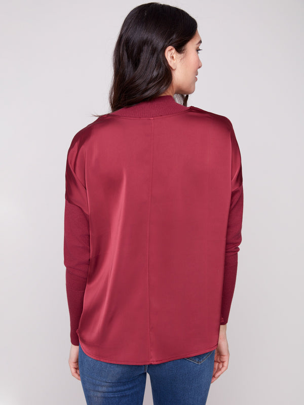 Elegant cabernet top featuring a mock neck and seamless design for a sophisticated appearance by Charlie B.