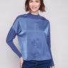 Moonlight satin knit top with ribbed cuffs and neckline, showcasing elegance in every detail by Charlie B.