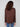 Stylish mocha top with unique front seam detail enhances the overall modern aesthetic by Charlie B.