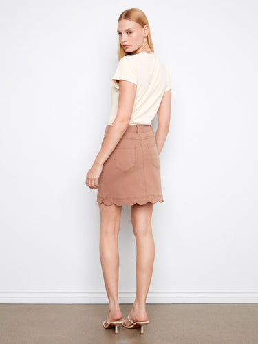 The scalloped hem design gives this skirt a unique flair, enhancing its overall appeal. Elevate your style with Charlie B.
