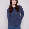 Moonlight Scuba Knit Top with a stylish crew neckline, showcasing a delicate design and long sleeves by Charlie B.
