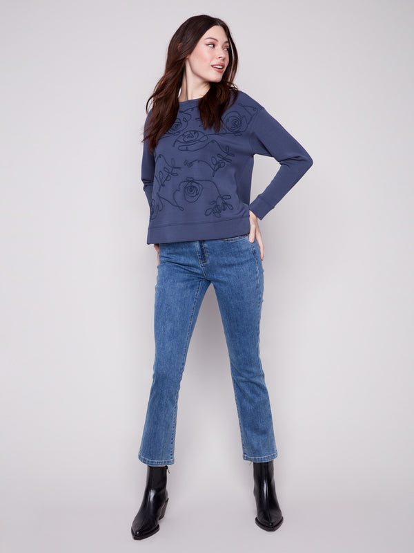 Elegant Moonlight Scuba Knit Top featuring intricate soutache front detail, perfect for any occasion by Charlie B.