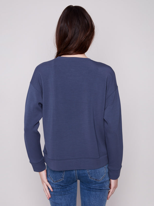 Chic Moonlight Scuba Knit Top with comfortable long sleeves, ideal for cooler days by Charlie B.