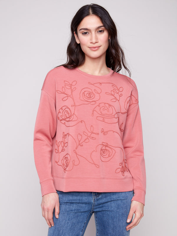 Primrose Scuba Knit Top with a stylish crew neckline, showcasing elegant design and comfort, perfect for any occasion by Charlie B.