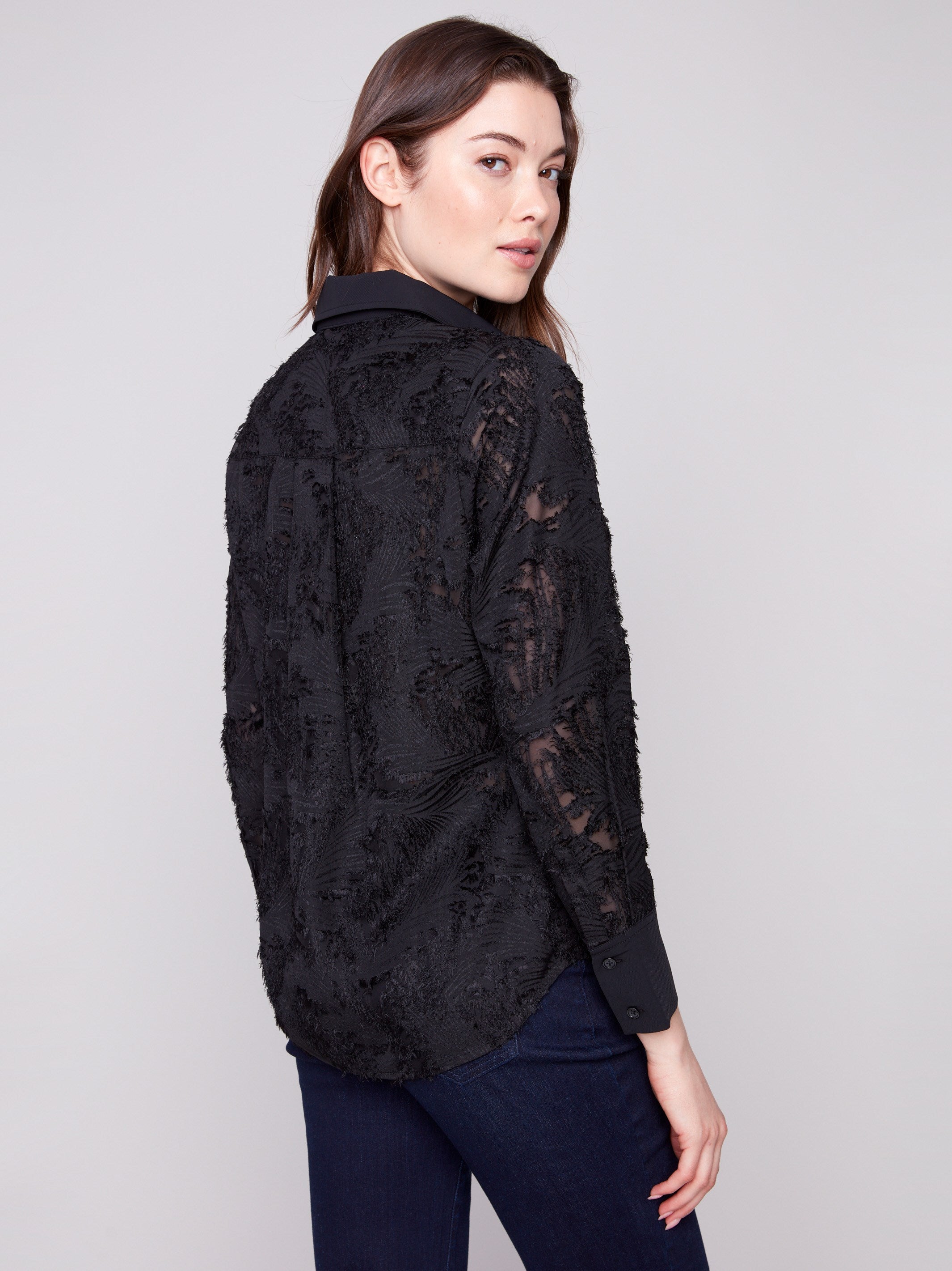 Black abstract pattern shirt in luxurious chiffon fabric with buttoned cuffs, adding elegance to any outfit by Charlie B.
