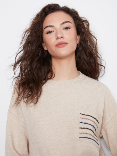 Stylish heather almond sweater with long sleeves and sequined pocket detail by Charlie B.