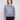 Heather grey sweater featuring a drop shoulder design with shimmering sequins for added style by Charlie B.