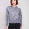 Heather grey sweater featuring a drop shoulder design with shimmering sequins for added style by Charlie B.
