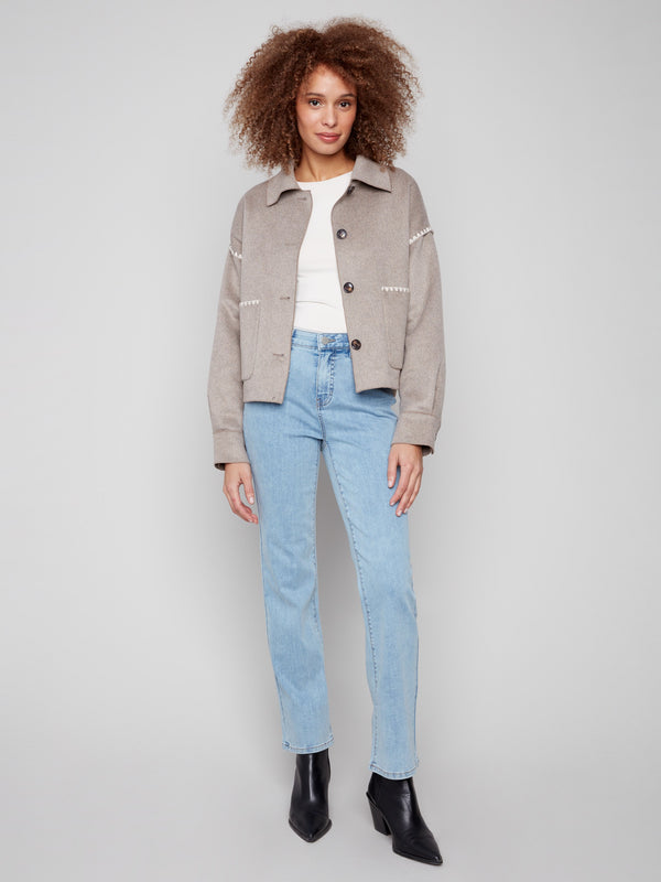 Stylish wool jacket with button front closure and chic patch pockets, ideal for casual outings by Charlie B.