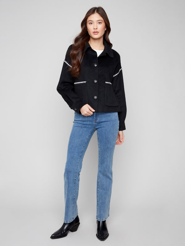 Stylish black jacket with a button front closure, adding a touch of sophistication to your wardrobe by Charlie B.