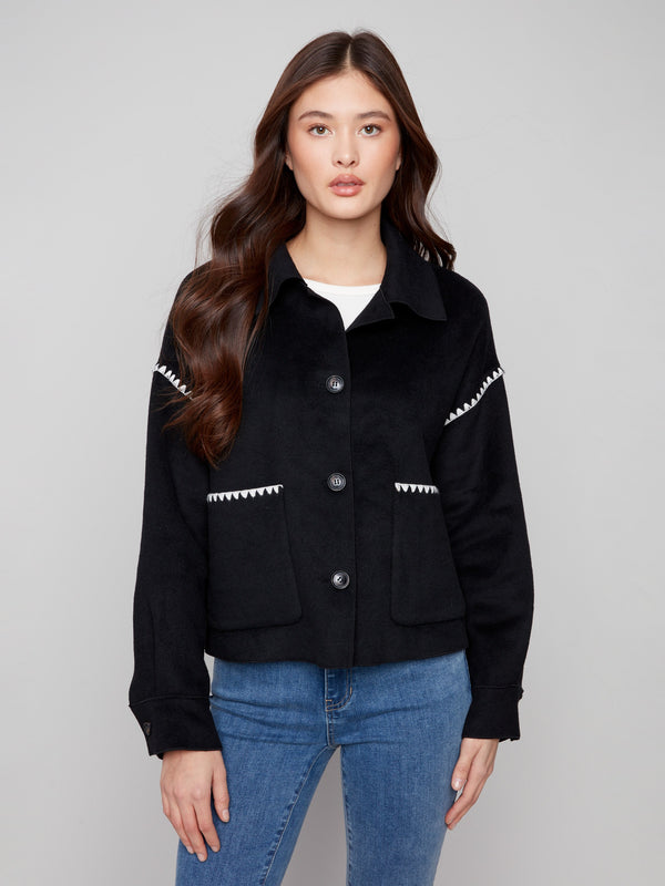 Chic black wool jacket designed with practical patch pockets on the front, blending style and utility by Charlie B.