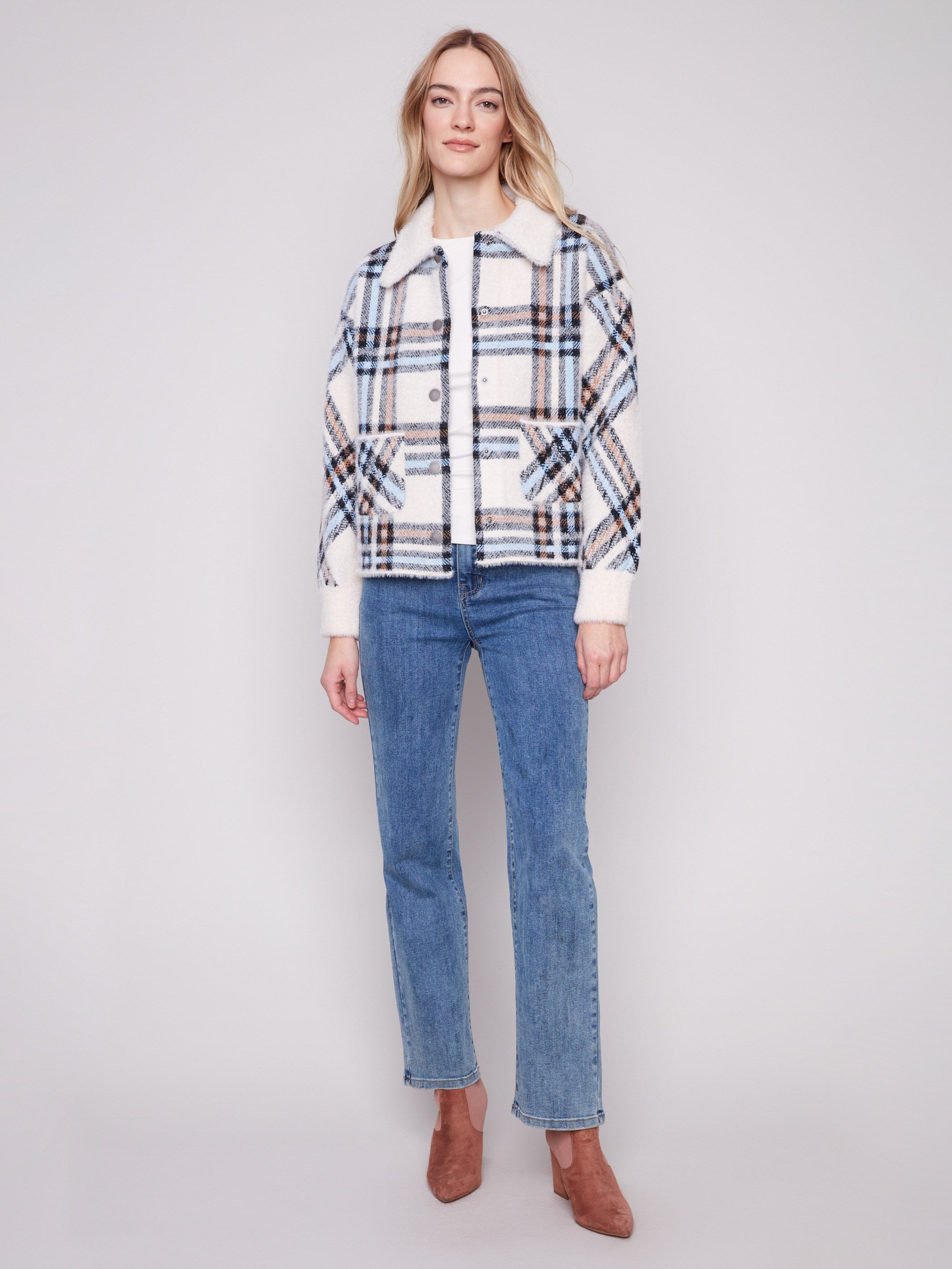 Ecru plaid knit jacket with a snap button closure and cozy patch pockets, designed for a modern look by Charlie B.