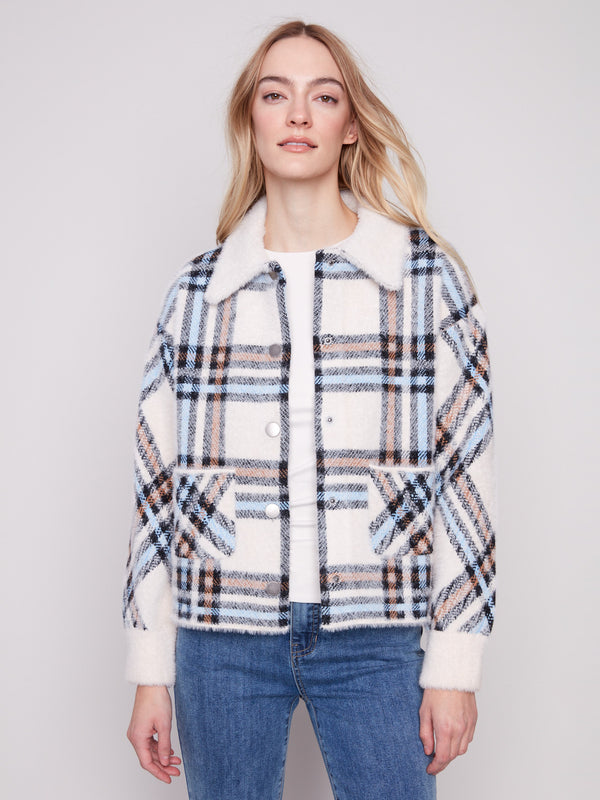 Experience the plushy texture of this ecru plaid knit jacket, perfect for stylish layering by Charlie B.