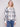 Stay warm in style with the snap button closure on this trendy ecru plaid knit jacket by Charlie B.