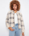 Chic plaid jacket with snap-button closure, offering a stylish and functional design. Perfect for versatile wear by Charlie B.