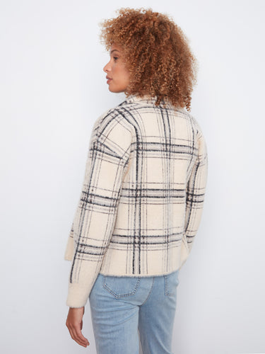 Plaid jacket showcasing sophisticated tailoring and contemporary style for modern fashion lovers by Charlie B.