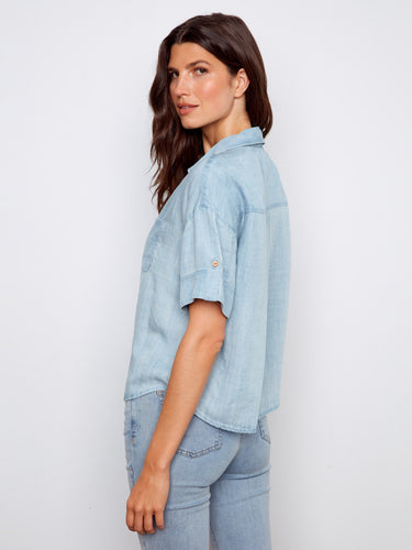 Chic sage blouse with a shirt collar and versatile button-front style by Charlie B.