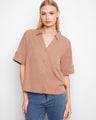 This stylish shirt features a classic shirt collar and chest pockets, perfect for both casual and formal occasions by Charlie B.