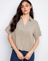 Casual shirt featuring a classic shirt collar and button-front design, perfect for versatile styling. By Charlie B.
