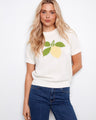 This stylish top features a classic crew neckline, perfect for any casual outing. Made from 100% cotton for comfort by Charlie B.
