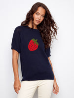 Navy sweater with a strawberry design, featuring a classic crew neckline for casual charm. Crafted from 100% cotton by Charlie B.