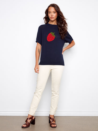 Elegant navy sweater adorned with a vivid strawberry motif, crafted entirely from breathable 100% cotton by Charlie B.