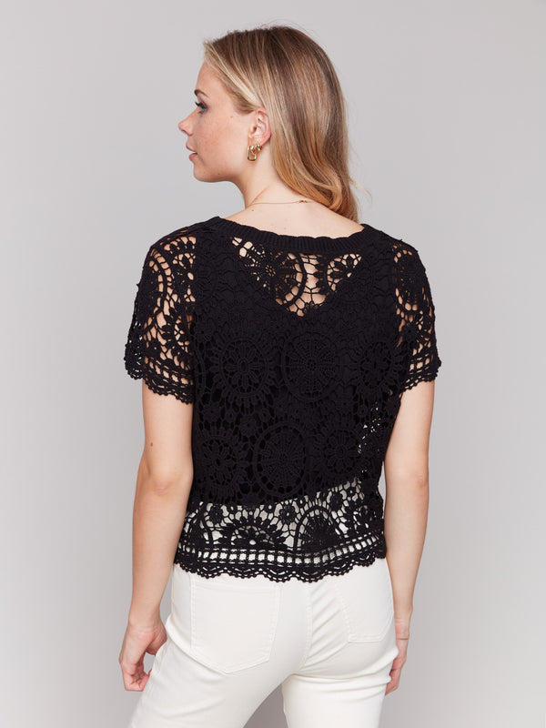 Sophisticated crochet bolero in noir with short sleeves by Charlie B.