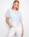 White crochet sweater with a relaxed fit, featuring a leaves pattern and short sleeves for casual elegance by Charlie B.