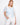 White crochet sweater with a relaxed fit, featuring a leaves pattern and short sleeves for casual elegance by Charlie B.