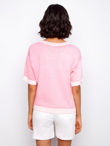 Chic pink top with a unique reverse print and comfortable relaxed fit. Made of pure cotton. By Charlie B.