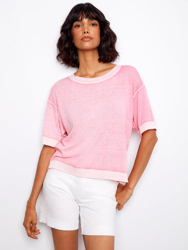 Trendy pink top featuring a crew neck and relaxed fit, perfect for casual wear. Crafted from 100% cotton by Charlie B.