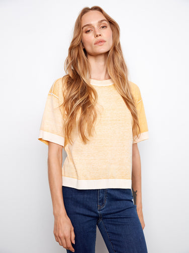 Crafted from premium 100% cotton, this top ensures breathability and ease for any occasion by Charlie B.