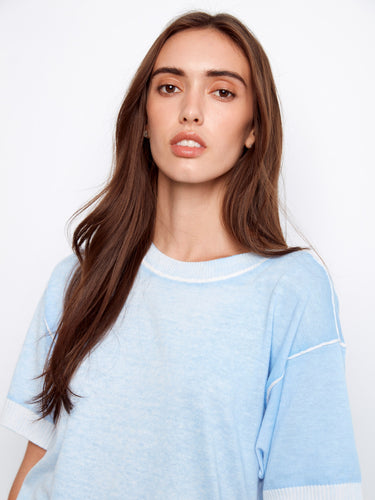 Featuring a crew neck, this blue short-sleeve sweater is perfect for everyday comfort by Charlie B.