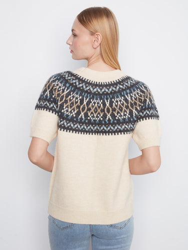 Ecru short sleeve sweater crafted from soft brushed knit with unique geometric accents by Charlie B.