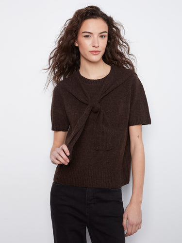 This elegant top showcases short sleeves and a chic attached sweater detail by Charlie B.