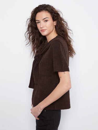 The short sleeves on this garment provide a relaxed yet fashionable look, perfect for any occasion by Charlie B.