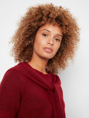 Fashionable red top made of luxurious soft knit fabric, complete with short sleeves for versatile wear by Charlie B.