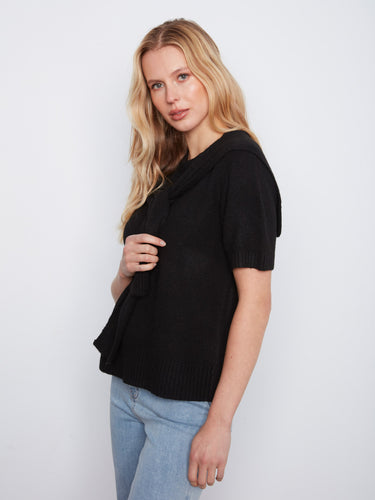 Elegant black short-sleeve sweater with an attached detail for added flair by Charlie B.