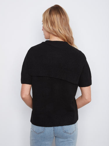 Chic black sweater crafted from soft knit fabric, ideal for layering by Charlie B.